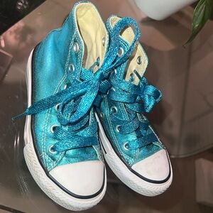 Blue, metallic converse shoes